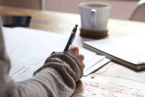 Student studing table note books coffee 