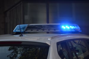 police cops car arrest terrorist 