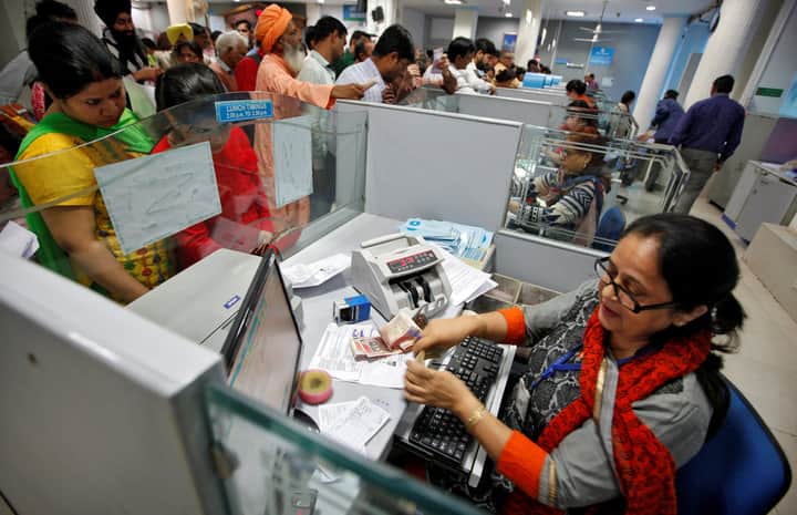 bank desk worker money Bengali News